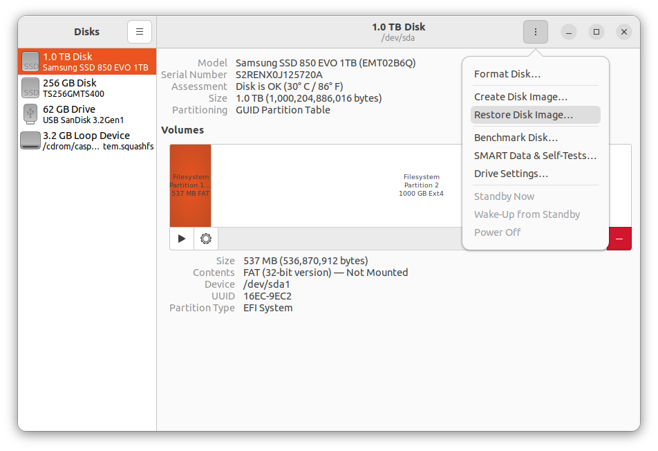 Discos: selecione o SSD interno à esquerda e Restaurar imagem de disco no menu.